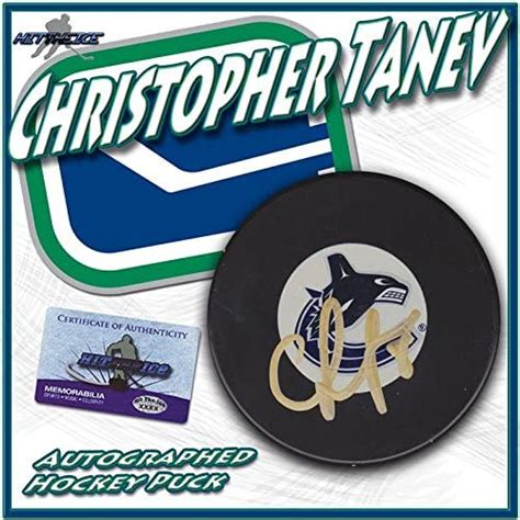 christopher tanev signed vancouver canucks puck w coa new autographed nhl pucks at amazon s