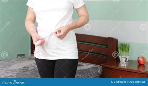 Young Woman Measuring Her Pregnant Belly With Centimeter Tape Stock Footage Video Of Stomach