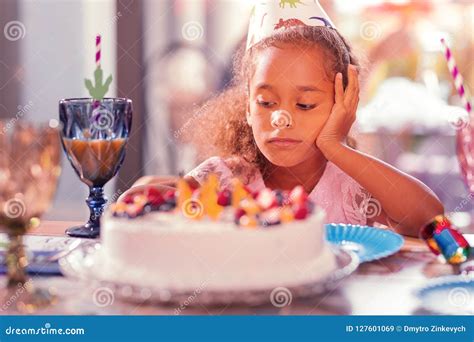 Tired Girl Feeling Bored While Being At Birthday Party Stock Image