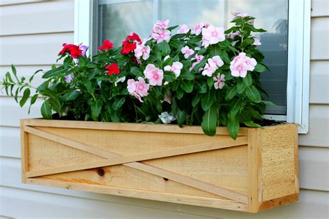 Next, line the bottom of the planter with landscaping cloth; How to Build a Cedar Window Box Planter