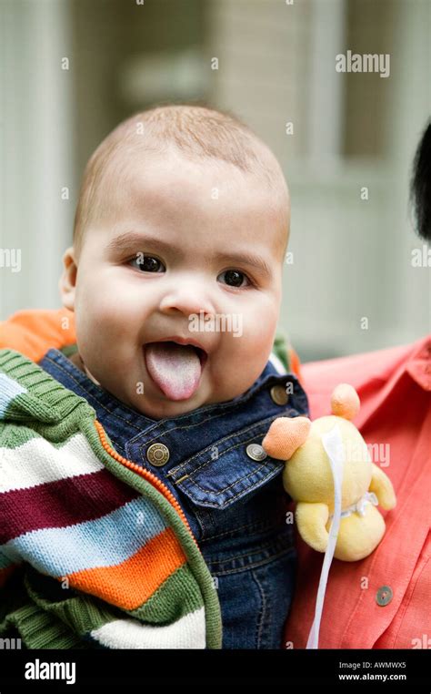 Baby Sticking Tongue Out Stock Photo Alamy