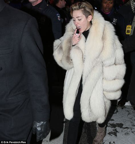 Miley Cyrus Is Spotted Spritzing Her Tongue With Throat Spray Ahead Of