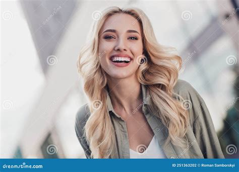 Portrait Of Attractive Cheerful Wavy Haired Girl Having Fun Strolling