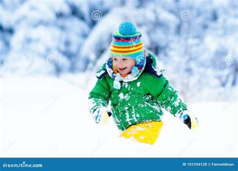 Child Playing With Snow In Winter Kids Outdoors Stock Photo Image