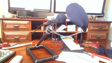 Use a clamp to hold the filter to the mic stand. The Apathy Coalition: DIY Desktop Mic Stand and Pop Filter