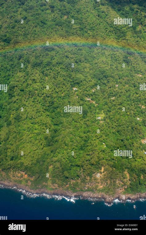 Rainbow Over The Forested Interior Of Ambae Island Showing The Rugged