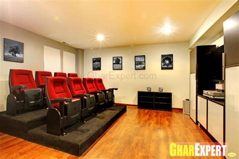 Home Theatre With Multi Sitting And Hardwood Flooring Gharexpert
