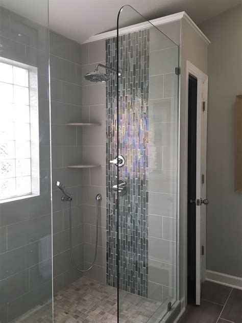 Shower With Waterfall Like Tile Display After Bathrooms Remodel