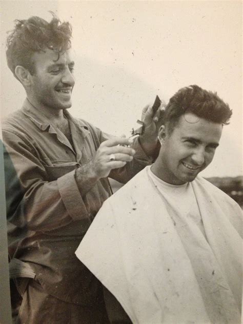 Maybe you would like to learn more about one of these? Handsome soldiers getting haircuts during WW2 : OldSchoolCool