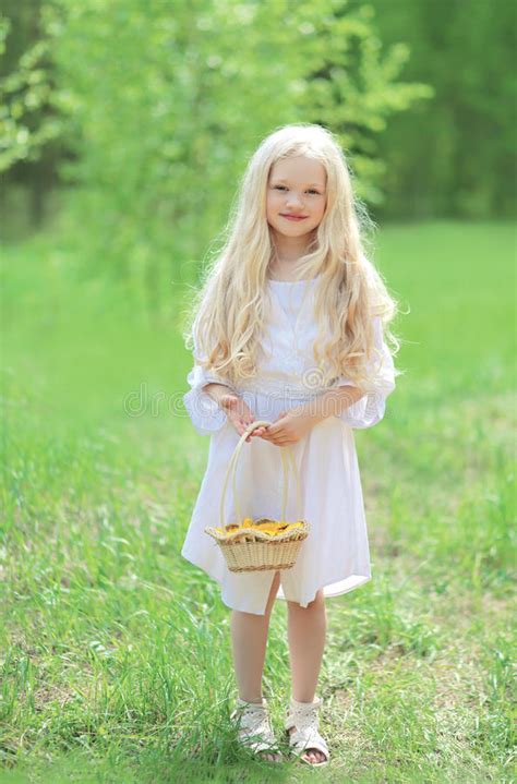 Short yellow dresses for cocktail parties, yellow long evening dresses, and formal ball gowns are available in shades of pineapple, banana, lemon, buttercream, mustard, and daffodil! Spring Portrait Of Cute Little Girl In White Dress Stock ...