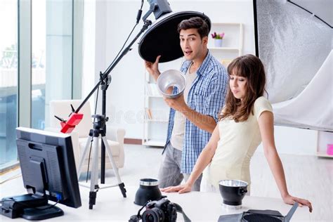 The Young Photographer Working In Photo Studio Stock Image Image Of