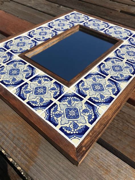 A black pediment highlights the beautifully sculpted french bow in this exquisite. LARGE Mexican Tiled Mirror with Blue and White | Etsy in ...