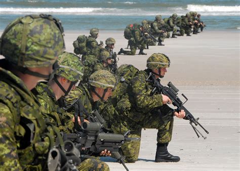 Fileus Navy 090425 N 2821g 192 Canadian Soldiers Storm The Beach Near