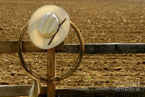 Cowboy Hat And Lasso On Fence Photograph By Olivier Le Queinec Fine