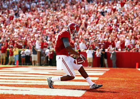 Amari Cooper 9 Of The Alabama Crimson Tide Takes In This Reception For A Touchdown Against The