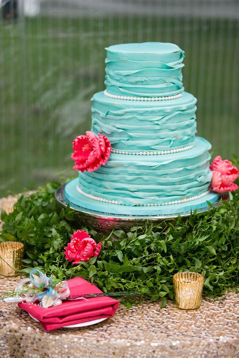 Turquoise Wedding Cake With Pink Sugar Flowers