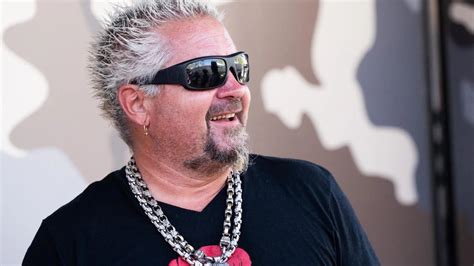 Guy Fieri Reveals Horrible News About His Iconic Flame Shirt Trendradars