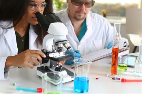 Two Scientists Of A Student Chemist Are Conducting Stock Image Image