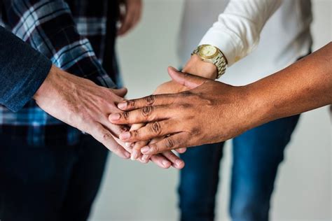 Premium Photo Diverse People Joining Hands Together Teamwork