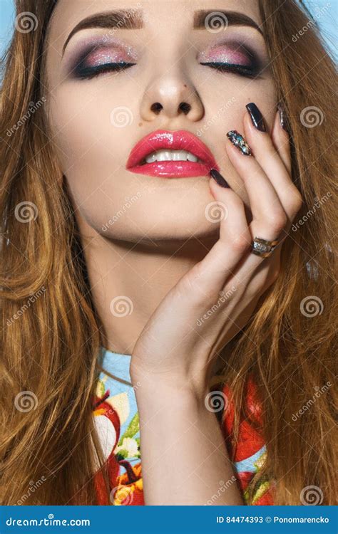 Portrait Of Beautiful Sexual Girl Who Keeps Hand On Her Face And Closed