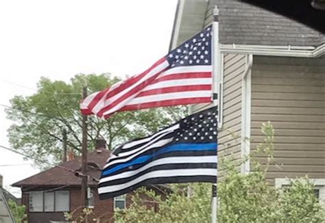 The Story Behind These Blue Line Flags Around Rockford