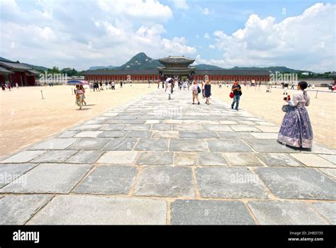 Visitors Dressed In Hanbok Traditional Costumes At The Gyeongbokgung