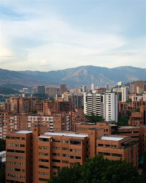 Beautiful Sunset In Medellin With Many Buildings In Background Stock