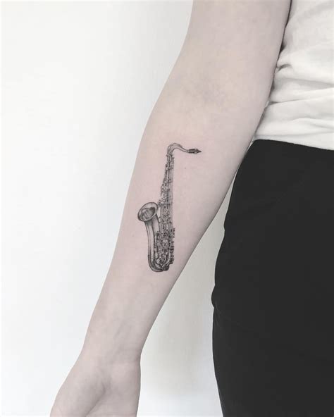 Sax Tattoo By Annelie Fransson Inked On The Right Forearm Saxophone