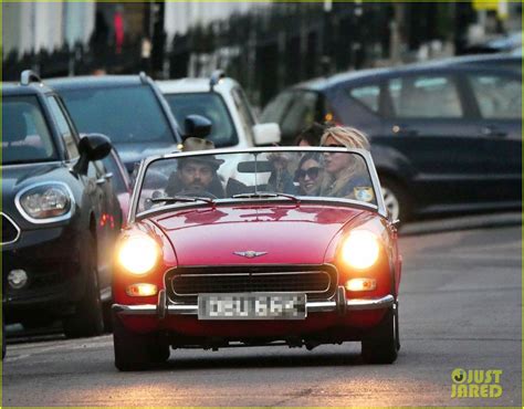 Full Sized Photo Of Lily James Piled Into A Two Seat Car With Some