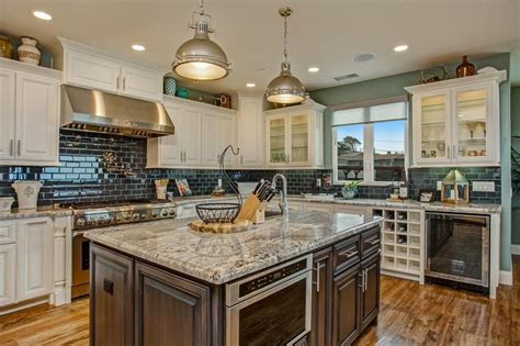 The white cabinets contrast with black countertops, and they would look off if it weren't of the mid tones. transitional-kitchen-with-antique-white-cabinets-black ...