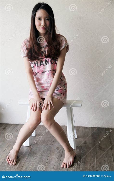 Beautiful Asian Woman Looking At Viewer Stock Image Image Of Girl Barefoot