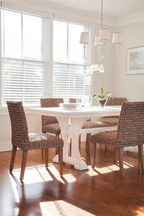 Do you like natural furniture? White Trestle Dining Table with Wicker Dining Chairs ...