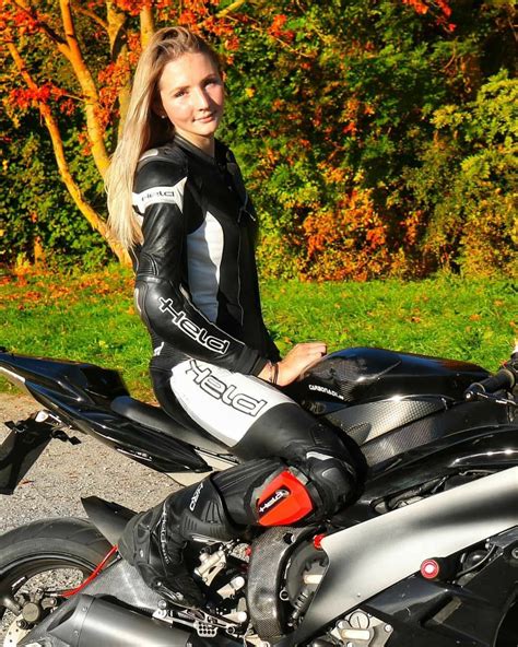 Blonde On Motorcycle In Black And White Riding Leathers Cafe Racer
