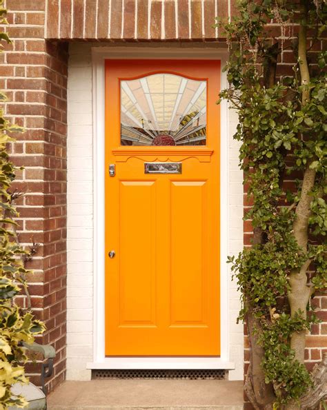 An Art Deco Front Door With Striking Stained Glass Details