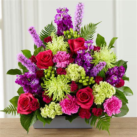 The Ftd Warm Embrace Arrangement In Midland Mi Lapelles Flowers And Ts