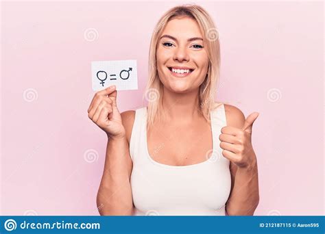 Young Blonde Woman Asking For Sex Discrimination Holding Paper With Gender Equality Message