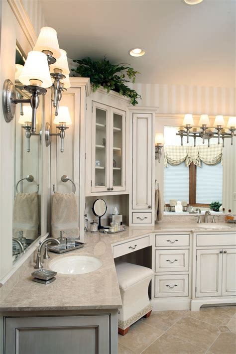 An Image Of A Bathroom Setting With White Cabinets And Marble Counter
