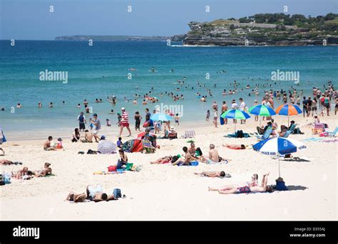 during a warm summer s day crowds of people flock to australia s iconic bondi beach sydney
