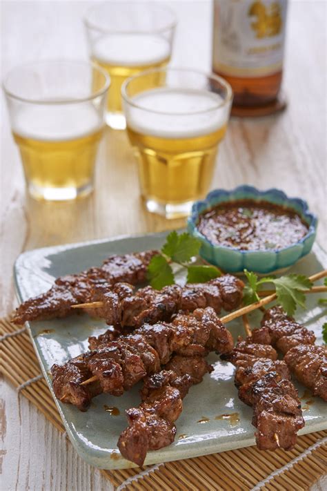 During this time, soak the bamboo skewers in water for a minimum of 30 minutes to prevent burning. Moo Ping Pork Skewers