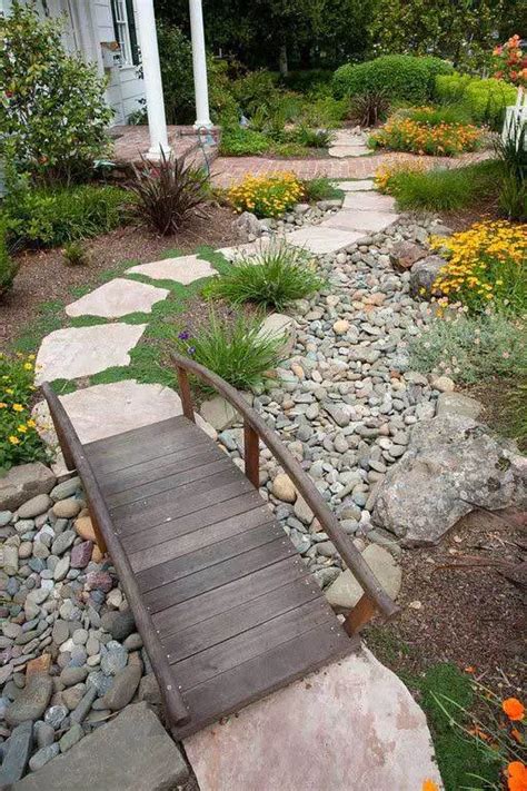 A Garden Bridge With Drought Tolerant Flowers 30 Low Water Landscaping