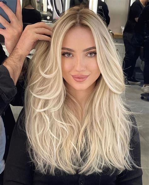 30 miraculously perfect feathered hair styles for 2023 summer blonde hair perfect blonde hair