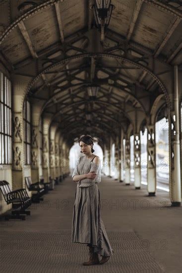 Portrait Of Serious Caucasian Woman At Train Station Photo12 Tetra Images Ivan Ozerov