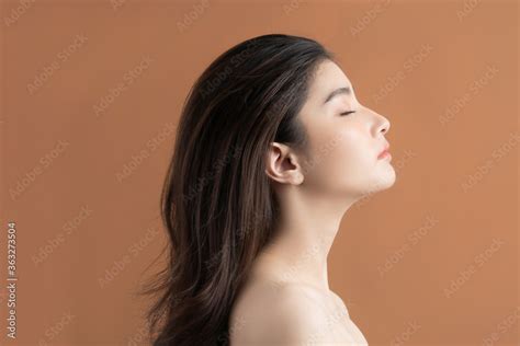 Beautiful Asian Woman With A Beautiful Face Side View Stock Photo