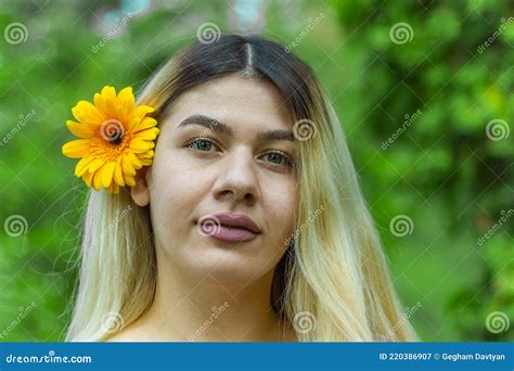 Pretty Young Girl With Sunflower Portrait Of A Woman With Flowers