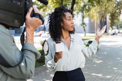 Pretty African American Journalist With Microphone Stock Image Image