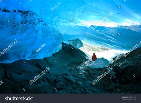 Explorer Inside Ice Cave Mendenhall Glacier Stock Photo 148397504