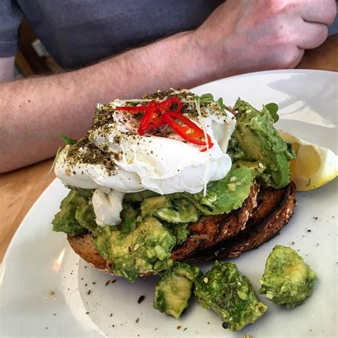 Smashed Avocado On Toast With Poached Eggs At Found Off Ch Flickr