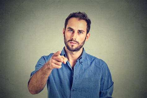 Angry Young Man Pointing Finger At You Camera Gesture Stock Image