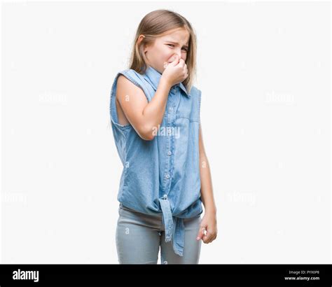 Young Beautiful Girl Over Isolated Background Smelling Something Stinky