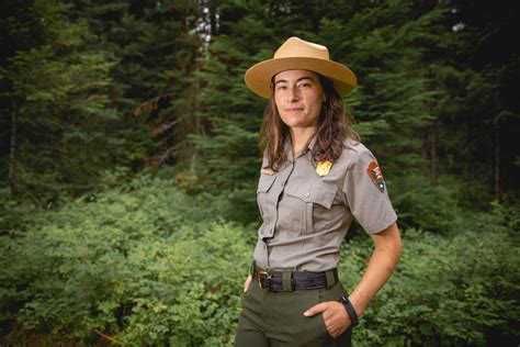 ranger peri a park ranger poses in uniform in front of a d… flickr
